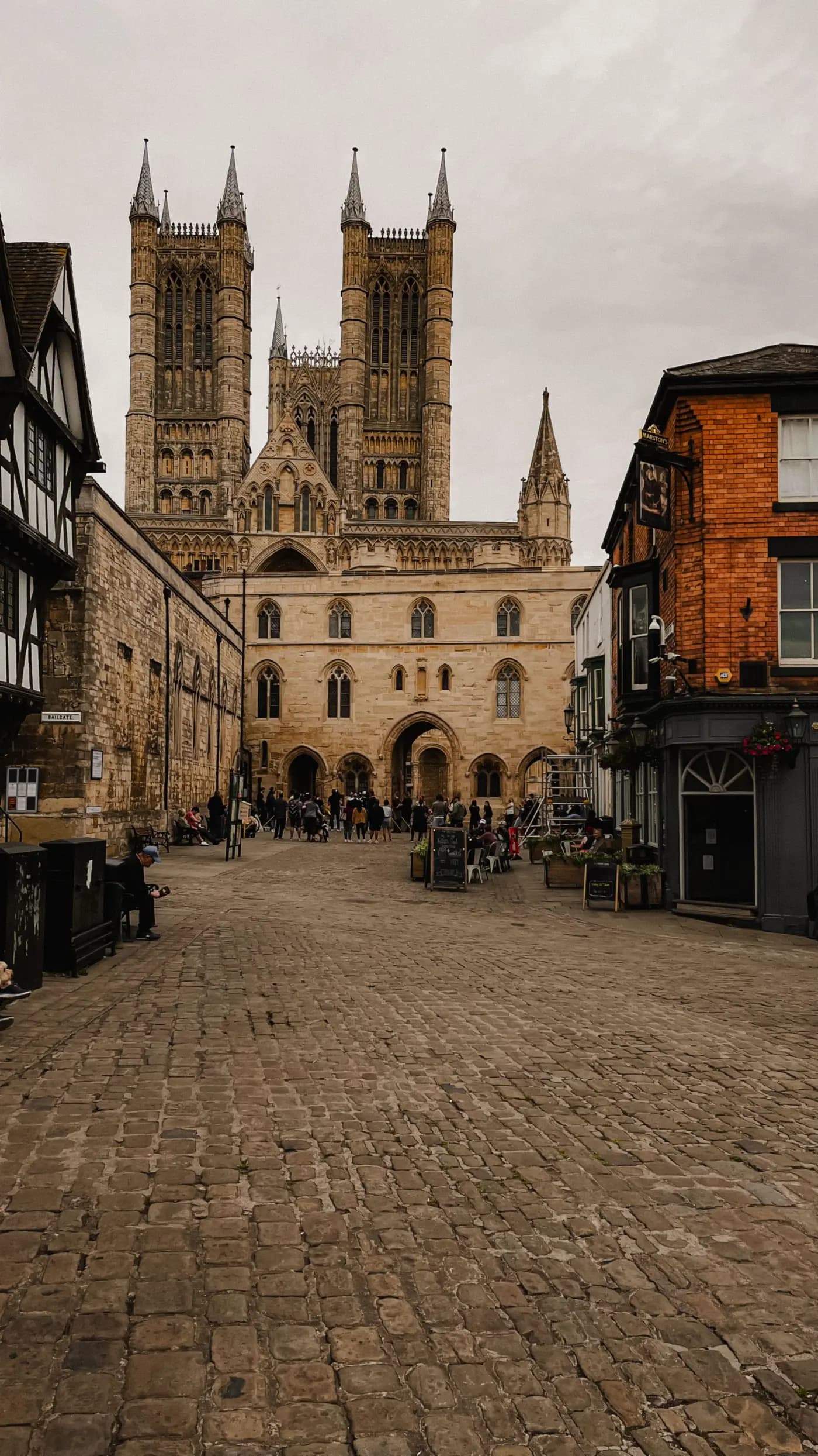Lincoln Cathedral above the cobbles of Bailgate